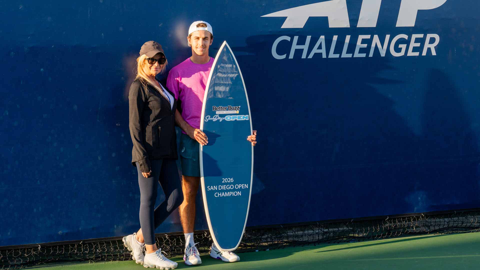 Zachary Svajda and his mother, Anita, at the San Diego Challenger trophy ceremony.
