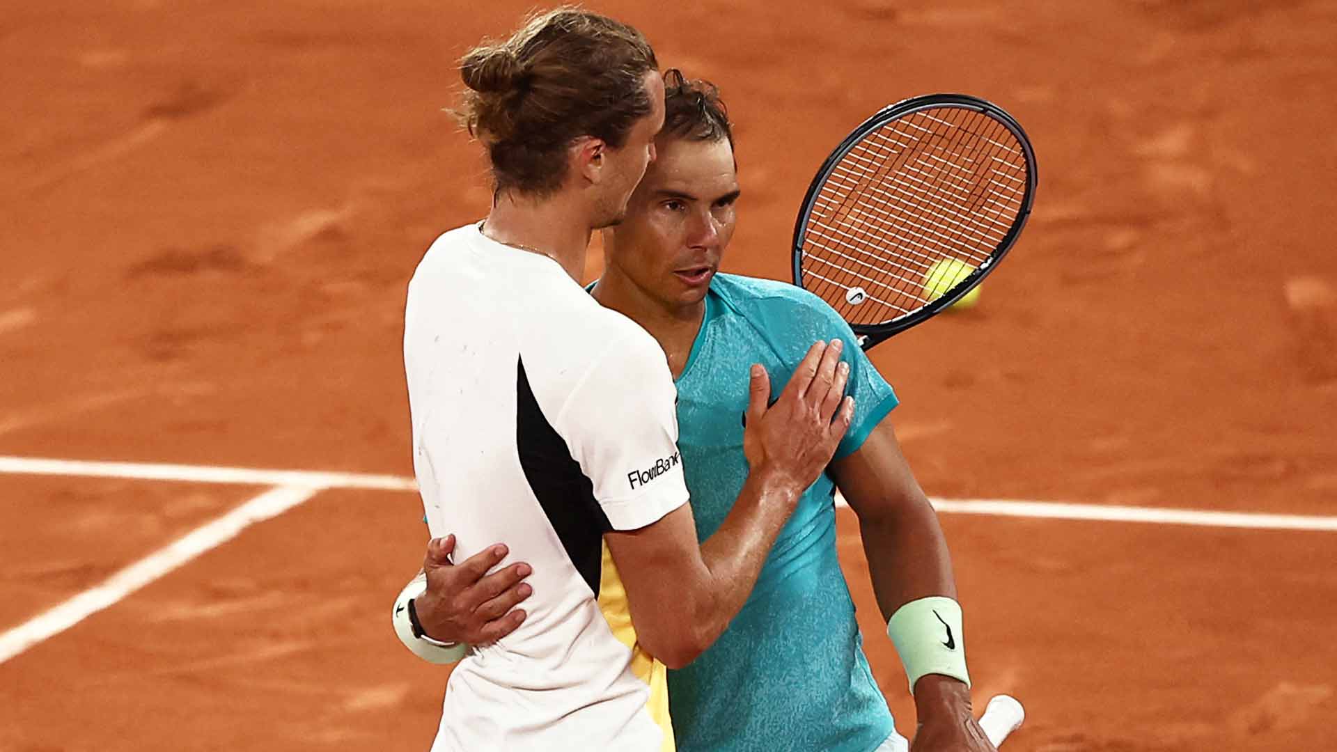Alexander Zverev and Rafael Nadal at the net following their first-round match at Roland Garros in 2024.