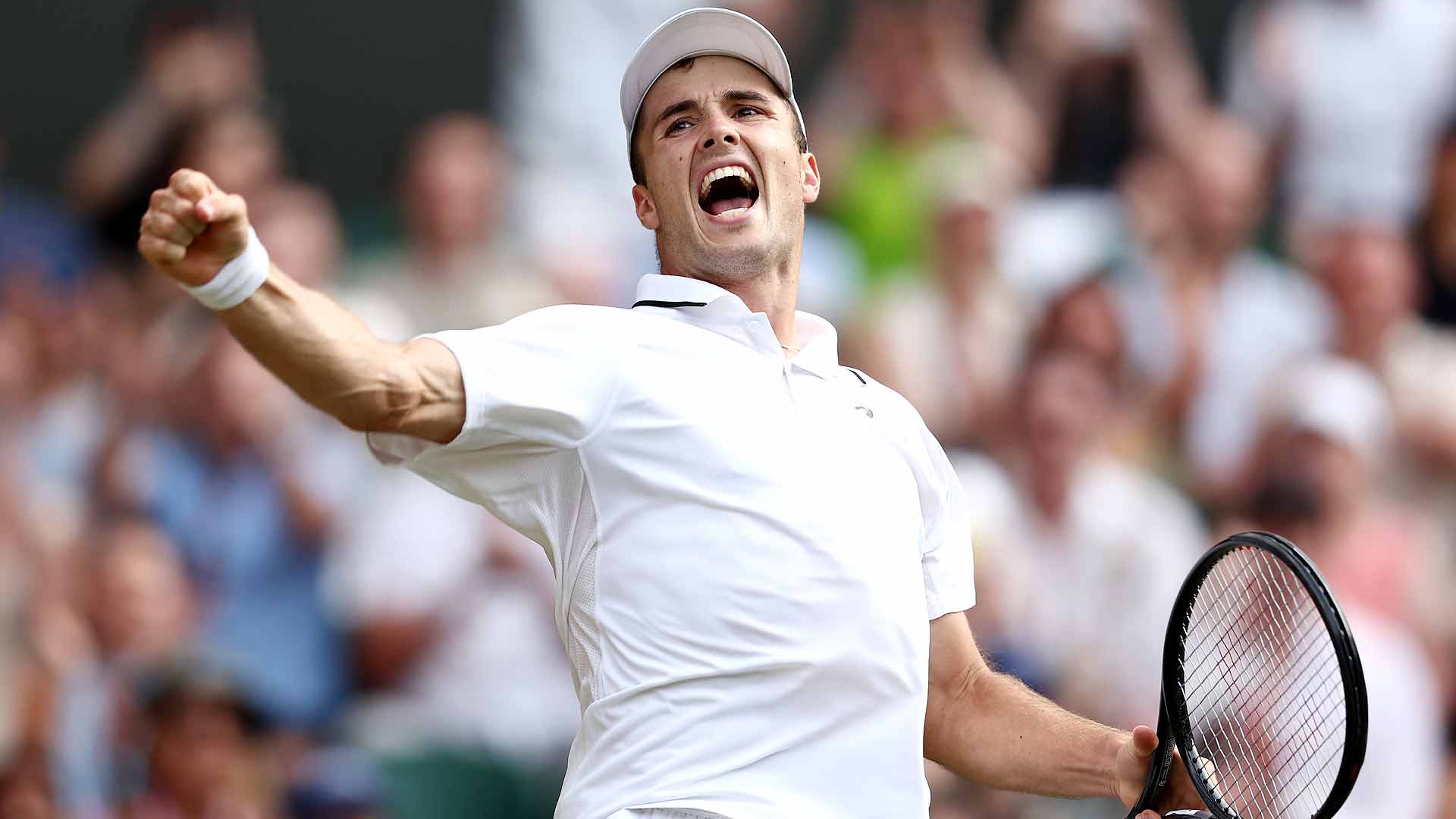 Arthur Fery celebrates during his five-set win against Grigor Dimitrov on Monday at Wimbledon.