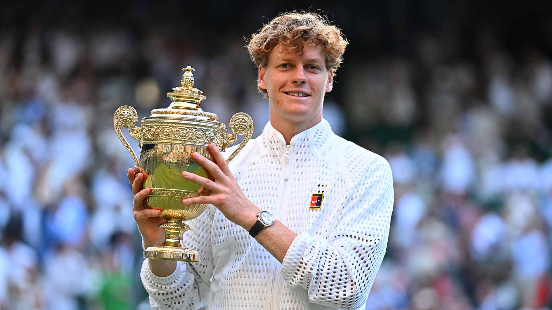 Jannik Sinner lifts his second Wimbledon trophy after defeating Alexander Zverev in four sets on Sunday.